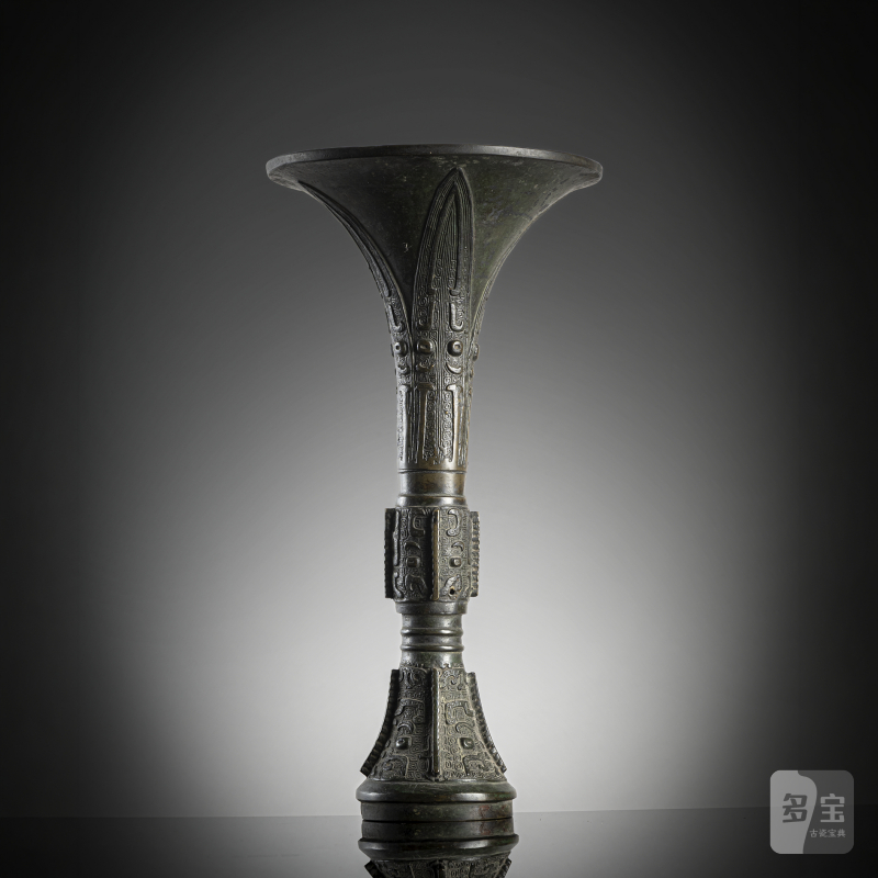 A bronze 'gu' vase with archaistic relief decoration